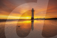 Perch rock lighthouse with dramatic sunrise, New Brighton, Cheshire