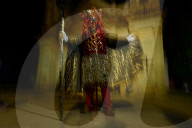 Comparsas or street dances at the village of San Jose Etla where people disguise as mythical creatures .