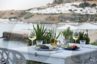 FIsh and salad served at a greek restaurant by the sea, Lindos, Rhodes, Greece