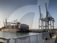 Port area of le Havre showing heavy lift dock cranes and container ship