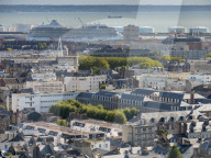 City skyline towards Seine estuary with cruise ship in docks