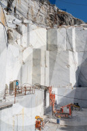 Stone cutter at Cervaiole Marble Quarry on Mount Altissimo, Seravezza, owned by Henraux, Tuscany, Italy (Property Release)