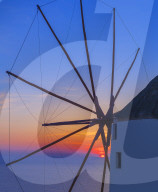 Wndmill at sunset, Oia, Santorini, Cyclades Islands, Greece