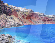 Oia village perched on Santorini caldera rim, Oia, Santorini, Cyclades Islands, Greece