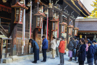 Japan, Kansai, Kyoto, worshippers at Kitano Tenmangu Shrine