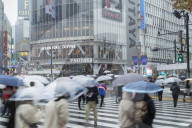 People walking across Shibuya Crossing, Shibuya, Tokyo, Japan