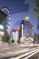 Ferris wheel and shopping street at dusk, Nagoya, Japan