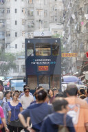 Tram passing along Chun Yeung Street market, North Point, Hong Kong Island, Hong Kong