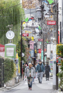 People walking past shops, Harajuku, Tokyo, Japan