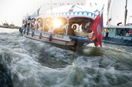Boats racing on the River Nile at sunset, Luxor