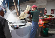 Noodle maker in Kashgar Sunday Market, main Silk Road trading centre, Xinjiang, China