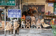 Solid Uyghur saddles for sale in Kashgar city centre, Silk Road, Xinjiang, China