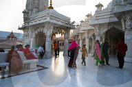 Visitors to the white marble Swaminarayan temple, built following the 2001 earthquake, Bhuj, Gujarat, India