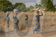 Togolese women walking in Savanes province, Togo.