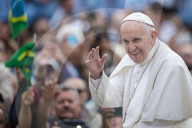 Pope Francis arrives for his weekly general audience in St. Peter's Square at the Vatican.