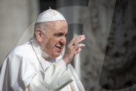 Pope Francis arrives for his weekly general audience in St. Peter's Square at the Vatican.