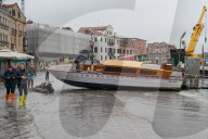 Stranded taxi boat during the high tide in Venice, november 2019, Venice, Italy, Europe