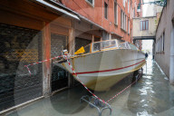 Stranded taxi boat during the high tide in Venice, november 2019, Venice, Italy, Europe