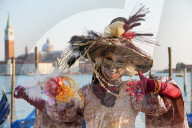 Masks at the Venice Carnival in St. Mark's Square, Venice, Veneto, Italy, Europe