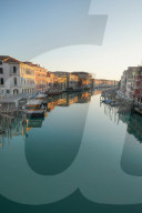 Reflections of the buildings in the calm water of the Grand Canal during Coronavirus lockdown, Venice, Italy, Europe