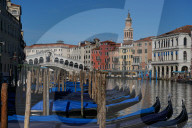 Gondolas on the Grand Canal and Rialto bridge during Coronavirus lockdown, Venice, Italy, Europe