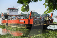 Arrival to the Kochi waterfront of the busy Fort Cochin to Fort Vypin car & passenger ferry; Kochi (Cochin), Kerala, India