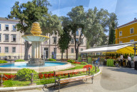 View of cafes and water fountain in Dante Square, Pula, Istria County, Croatia, Adriatic, Europe