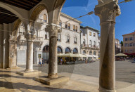 View of cafes from arches of the Town Hall in Forum Square, Pula, Istria County, Croatia, Adriatic, Europe