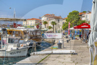 View of boats and buildings in the harbour of the Old Town of Porec and Adriatic Sea, Porec, Istria, Region, Croatia, Europe