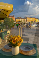 View of restaurant table set and Old Town buildings, Rovinj, Istria, Croatia, Adriatic, Europe