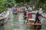 View of boats on waterway in Zhujiajiaozhen water town, Qingpu District, Shanghai, China, Asia