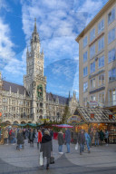 View of the New Town Hall clock tower (Rathaus) and Christmas Market in Marienplatz, Munich, Bavaria, Germany, Europe