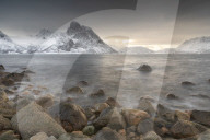 Snow covered mountains near to Stonglandseidet on the island of Senja, Norway.