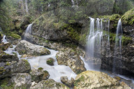 Ponte Pent de Giaveis waterfall in the Dolomites, Italy.