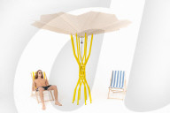 FEATURE - Hightech-Strandschirm kann mit Solarstrom Mini-Kühlschrank betreiben