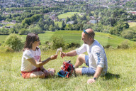 Members of the public enjoy a walk on Box Hill, Surrey as the warm weather continues.