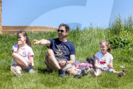 Members of the public enjoy a walk on Box Hill, Surrey as the warm weather continues.