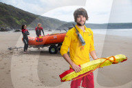 UK lifeguards gear up for busiest summer as millions head for coast. Good weather, foreign travel bans and lockdown exhaustion will propel 30 million to beach in coming months