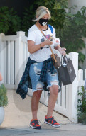 Tori Spelling is seen without her wedding ring as she leaves a hair salon in the San Fernando Valley. 