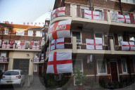 Hundreds of England flags adorn London housing estate in Euros fan frenzy.