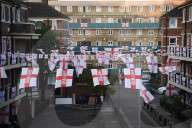 Hundreds of England flags adorn London housing estate in Euros fan frenzy.