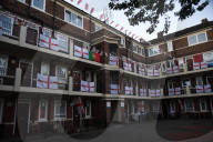 Hundreds of England flags adorn London housing estate in Euros fan frenzy.