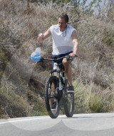 Rande Gerber is seen riding his bike in Malibu during a California heatwave.
