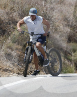 Rande Gerber is seen riding his bike in Malibu during a California heatwave.