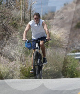 Rande Gerber is seen riding his bike in Malibu during a California heatwave.