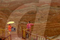 FEATURE -  Touristen in den Rainbow Mountains in Wangye, China