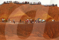 FEATURE -  Touristen in den Rainbow Mountains in Wangye, China