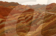 FEATURE -  Touristen in den Rainbow Mountains in Wangye, China
