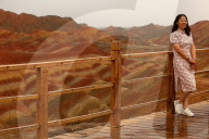 FEATURE -  Touristen in den Rainbow Mountains in Wangye, China