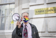 LGBT+ protestors highlight laws regarding gay conversion therapy during a demonstration outside The Cabinet Office, Whitehall, London, Great Britain 
23rd June 2021